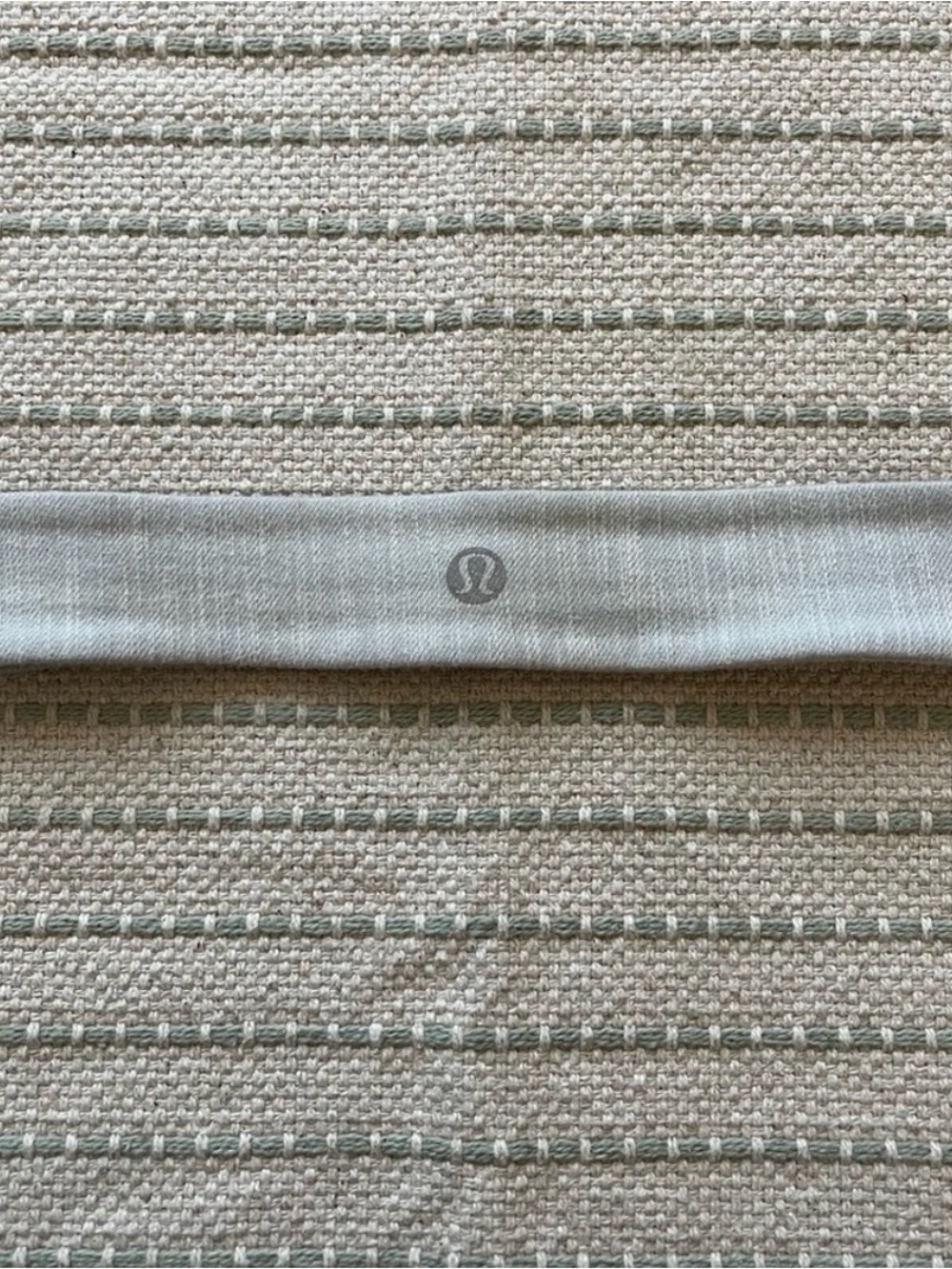 lululemon athletica light gray headband with reflective logo